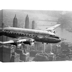 Tableau sur toile. Anonyme, Avion en vol sur New York, 1946